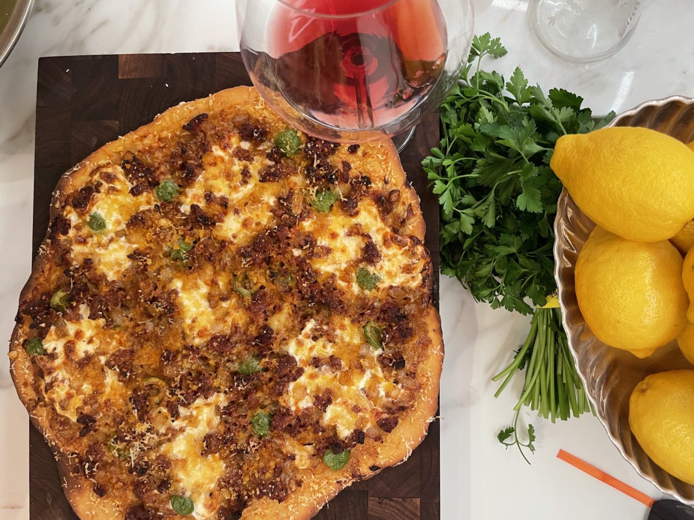 Spicy Italian Sausage + Green Olive Pizza