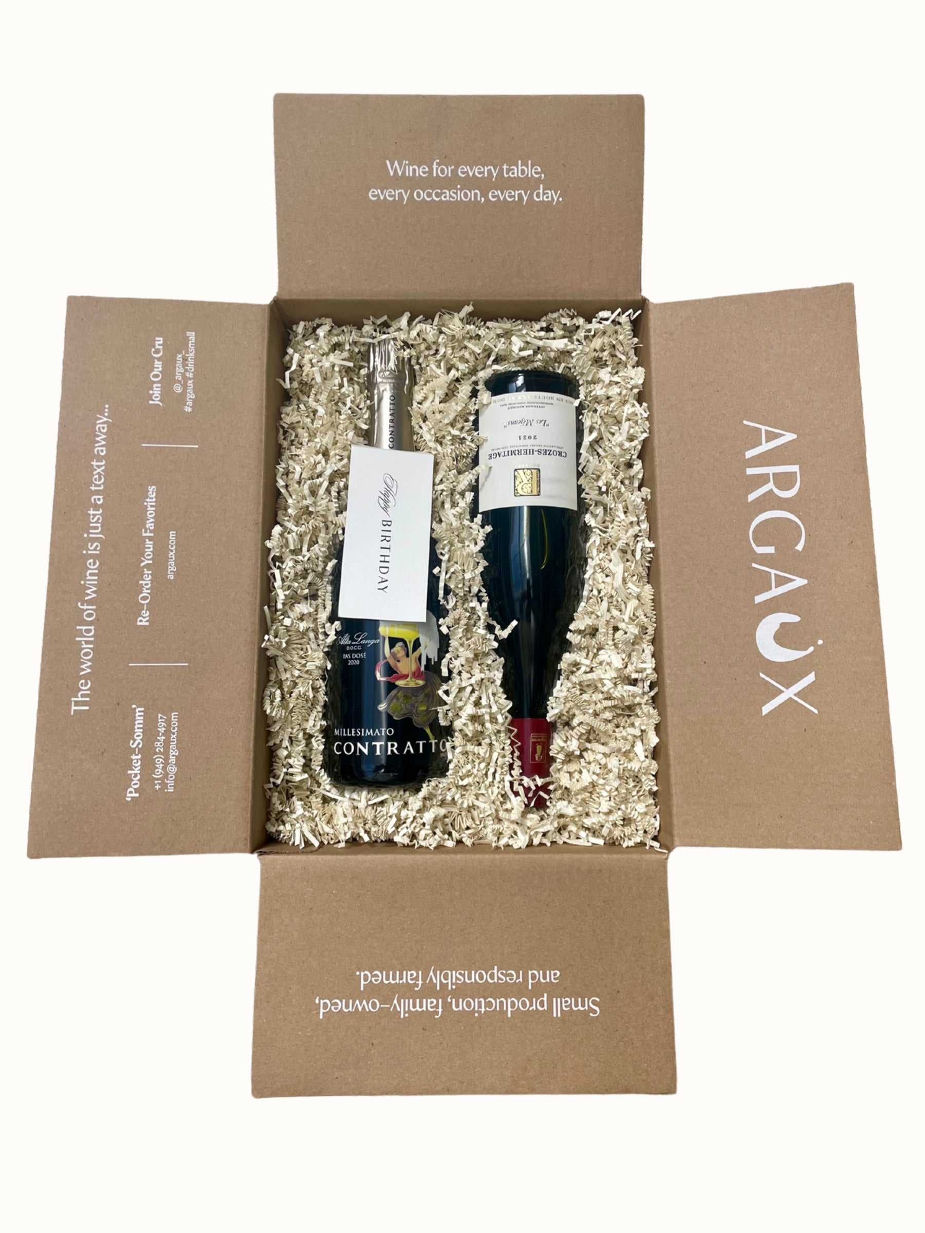 Wine bottles in a gift box with 'Arcaux' branding on a white background