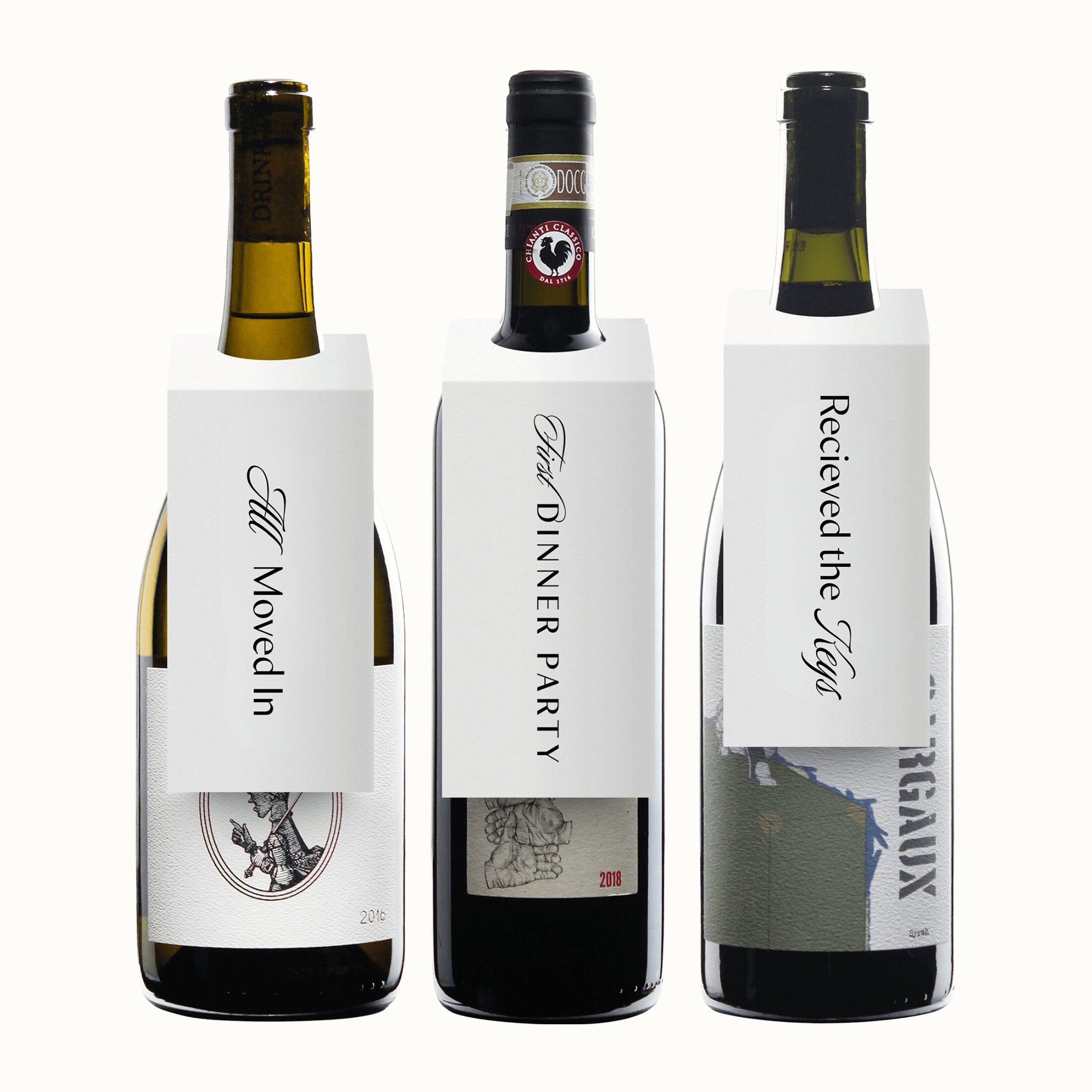 3 bottle housewarming wine gift set on white background with unique event celebratory labels.